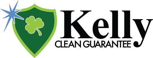 Kelly Clean Guarantee logo with green shield and clover emblem symbolizing protection and quality roofing services