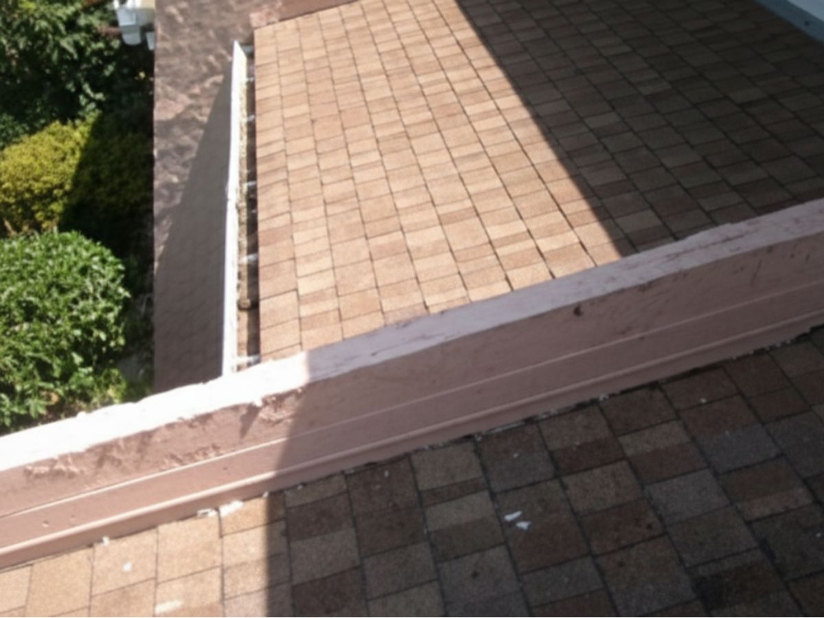 Improperly installed flashing at roof-to-wall transition