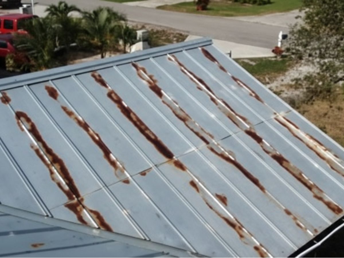 Rust streaks on standing seam metal roof