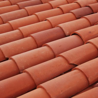How Long Do Tile Roofs Last in Florida? Exploring Their Longevity and Durability 2 close up of orange red clay tile roof